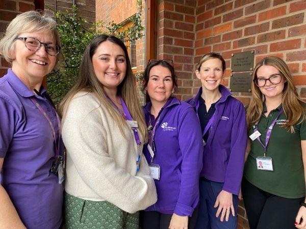 Wellbeing Team members smile 