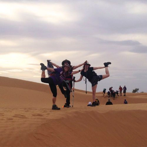 Hospice trekkers standing on one leg